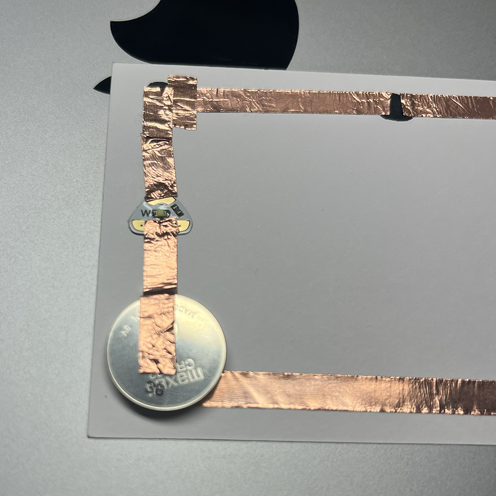 Making test of low voltage electricity by having graphite to connect the electricity #2.